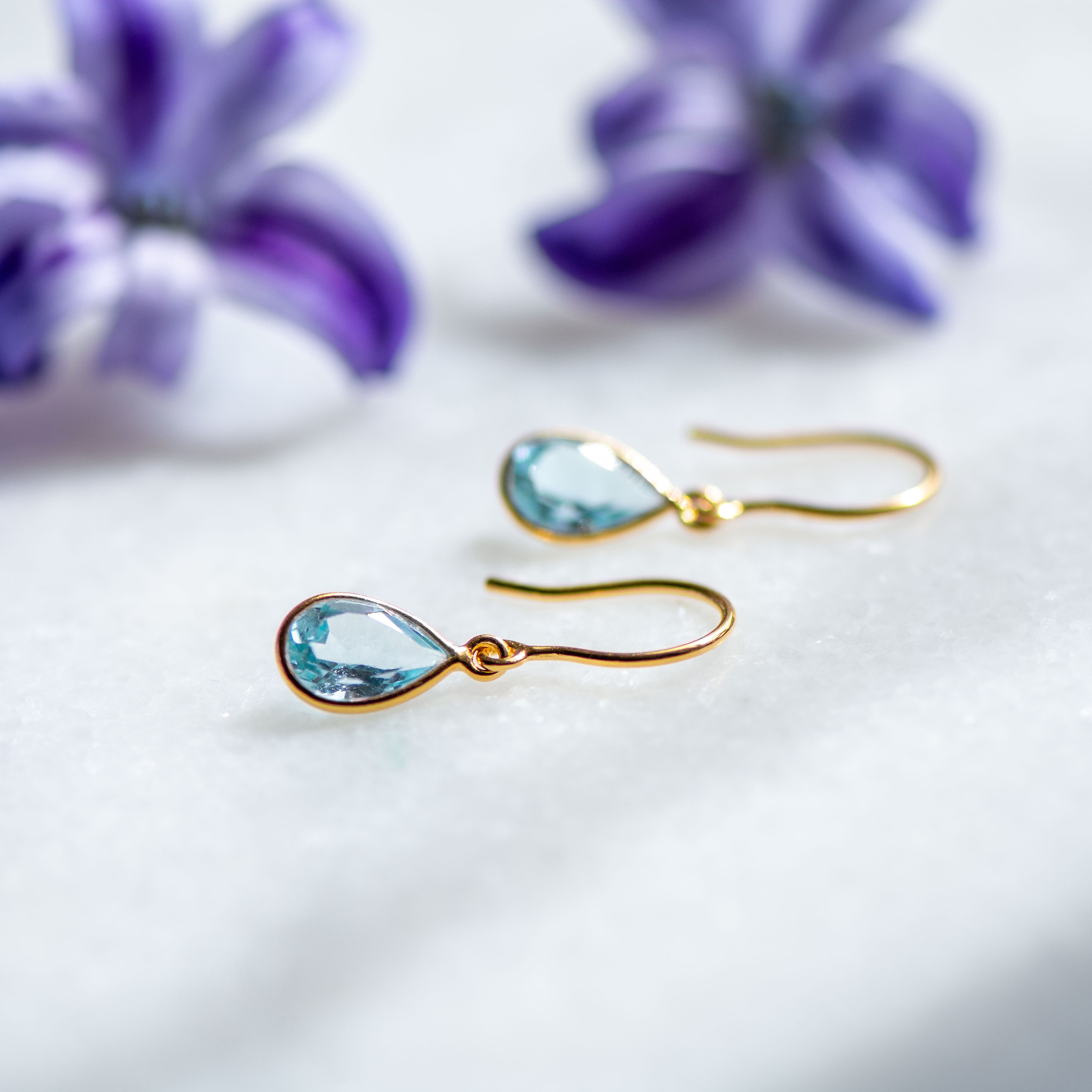 Tear Drop Earrings in Gold with Blue Topaz