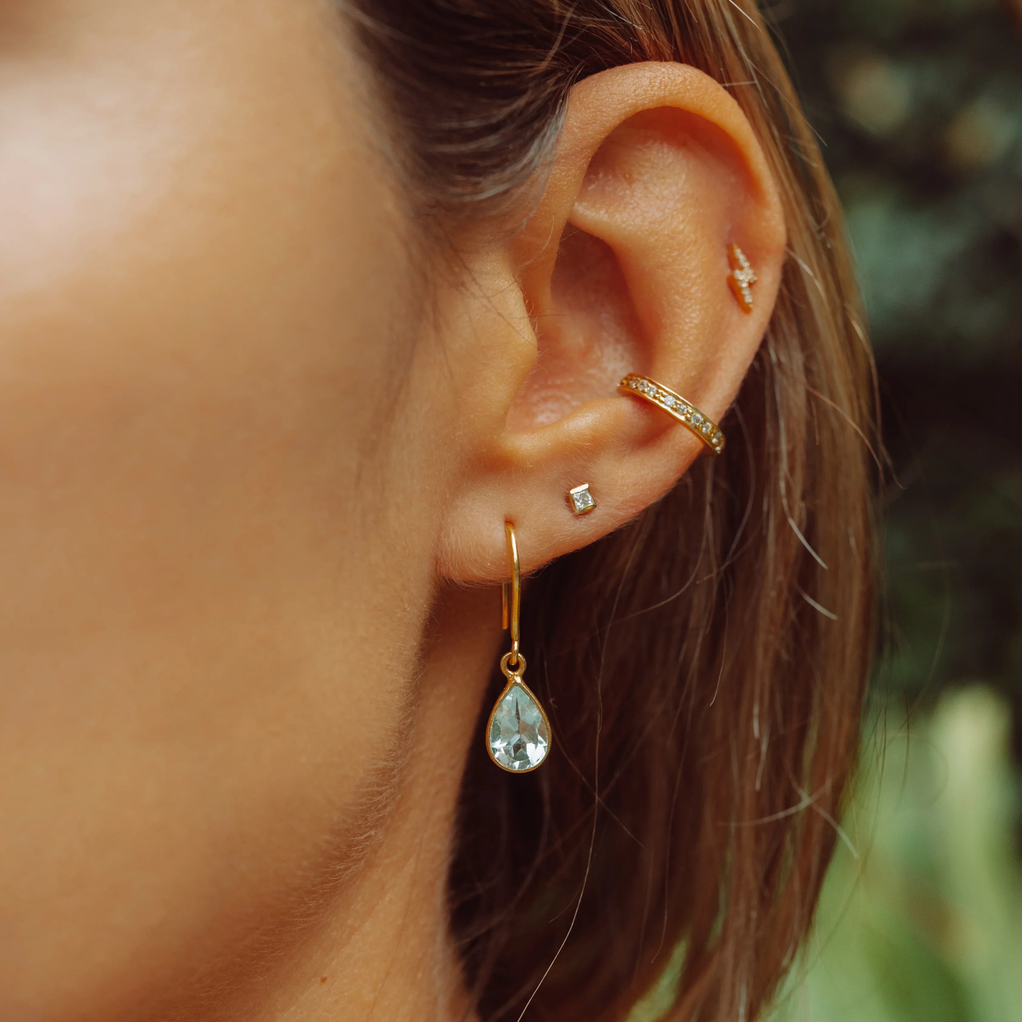 Tear Drop Earrings in Gold with Blue Topaz