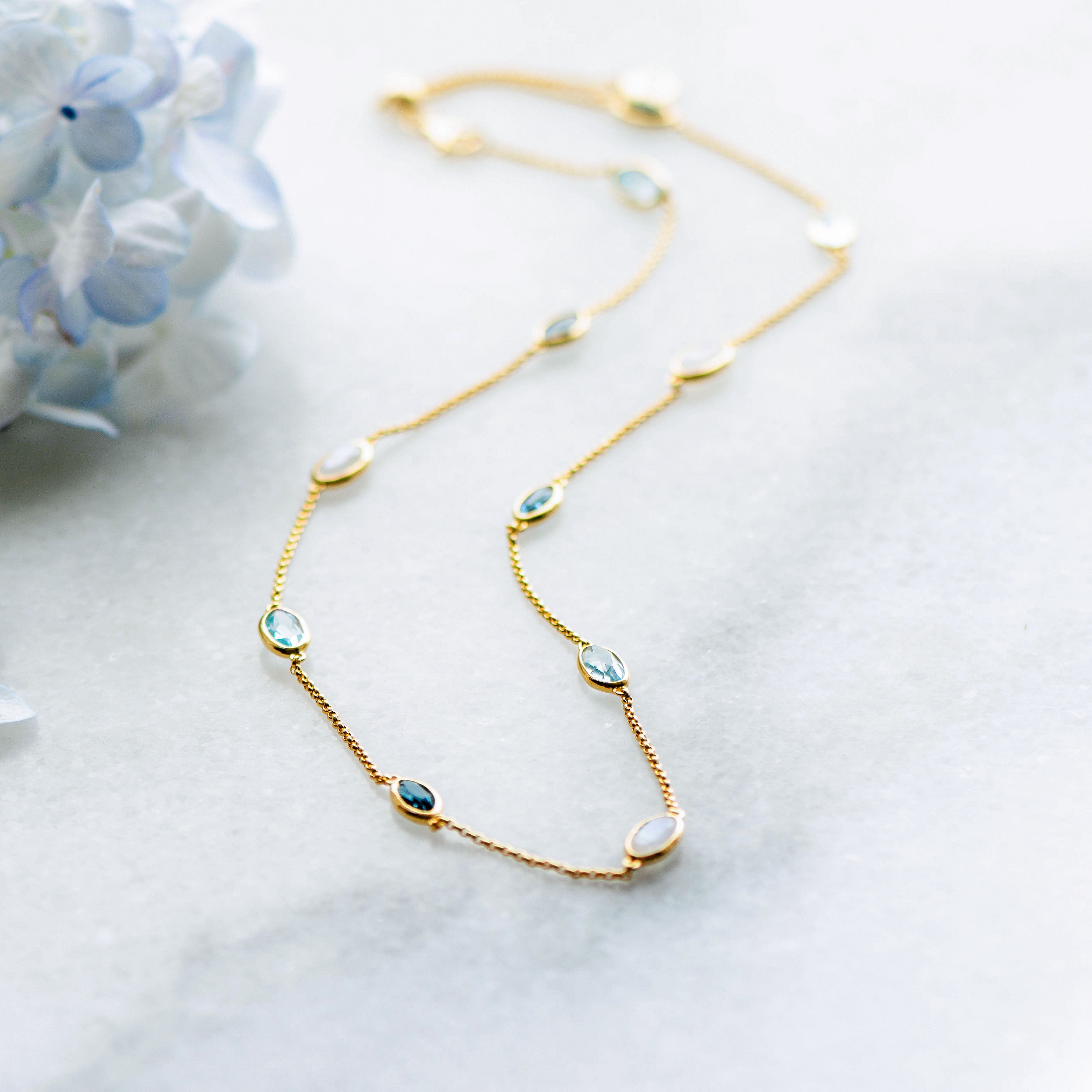 Lola Necklace in Gold With London Blue Topaz, Sky Blue Topaz and Rainbow Moonstone