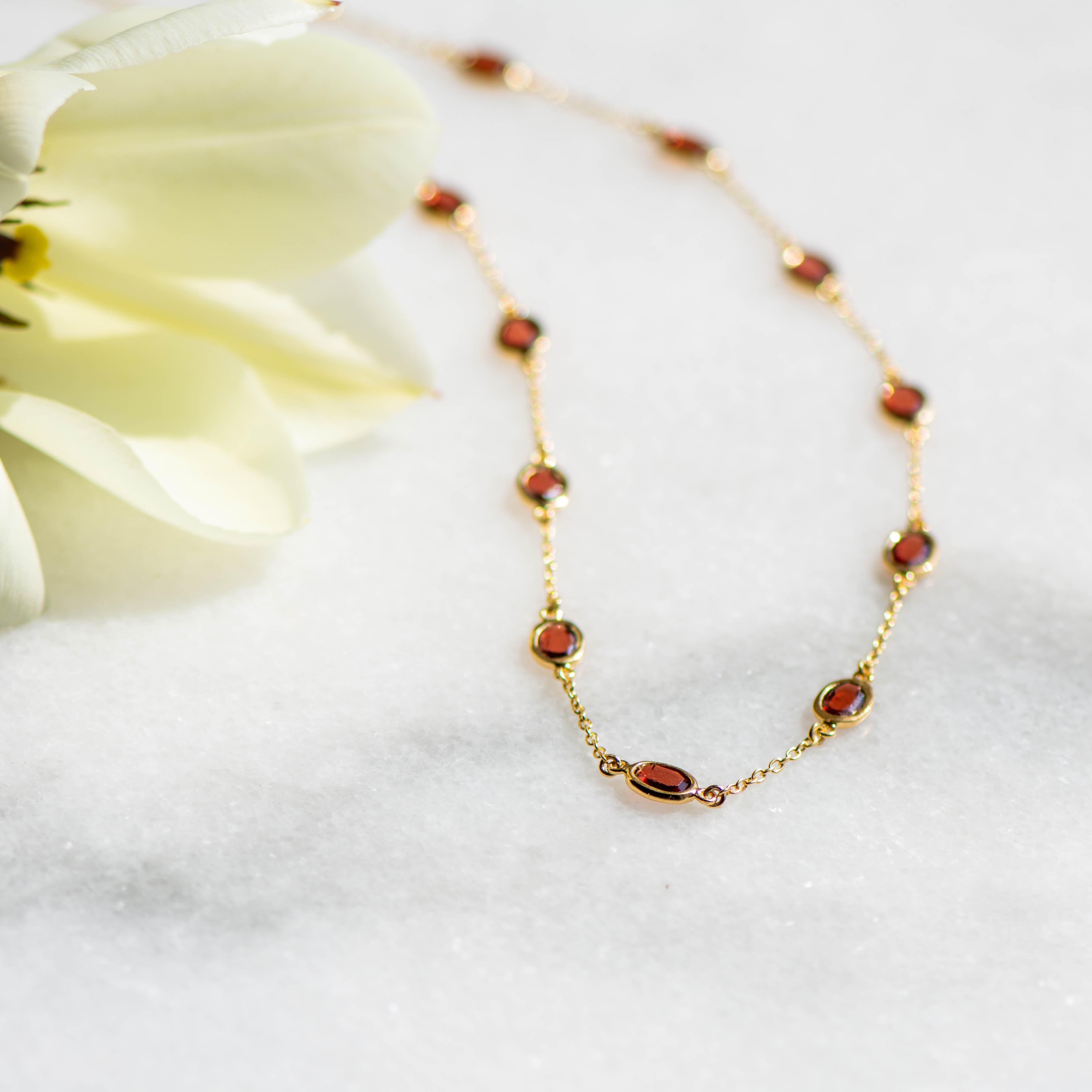 Marilyn Necklace and Cascade Earrings in Gold With Garnet