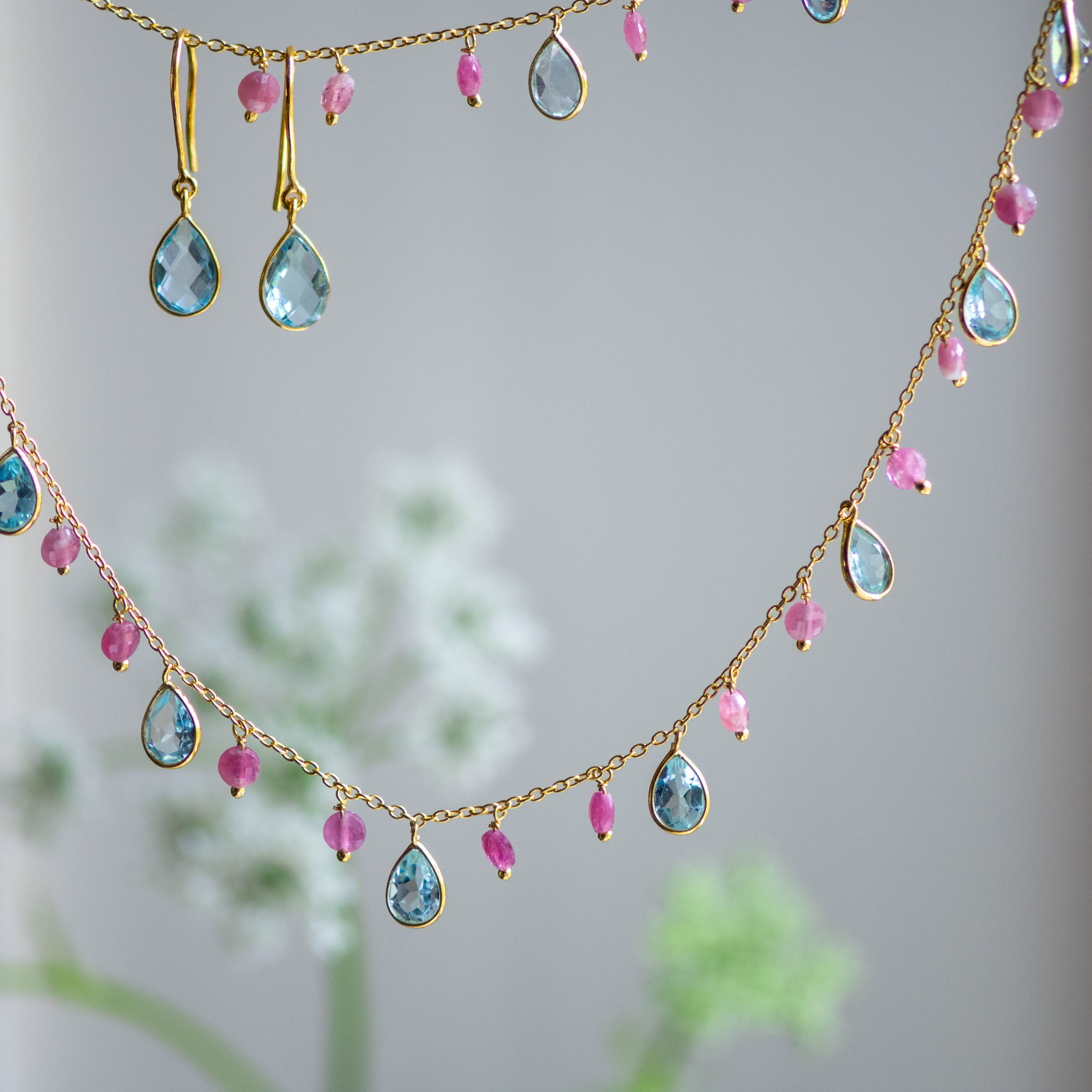 Tear Drop Earrings in  Gold with Blue Topaz