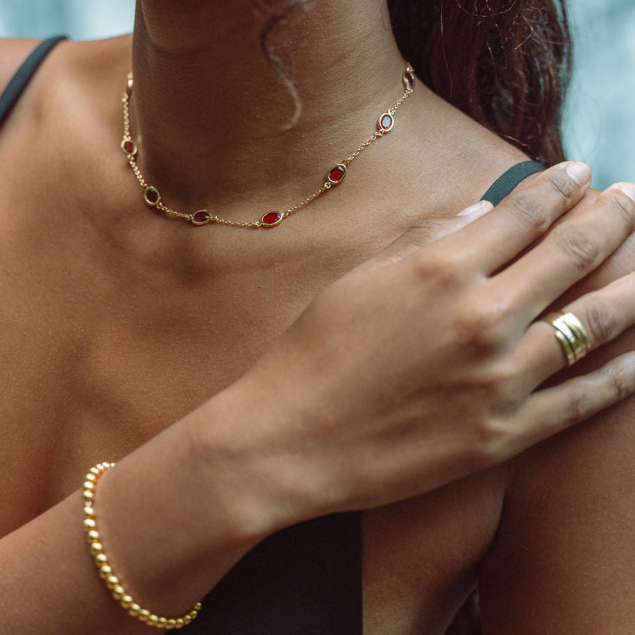 Marilyn Necklace and Cascade Earrings in Gold With Garnet