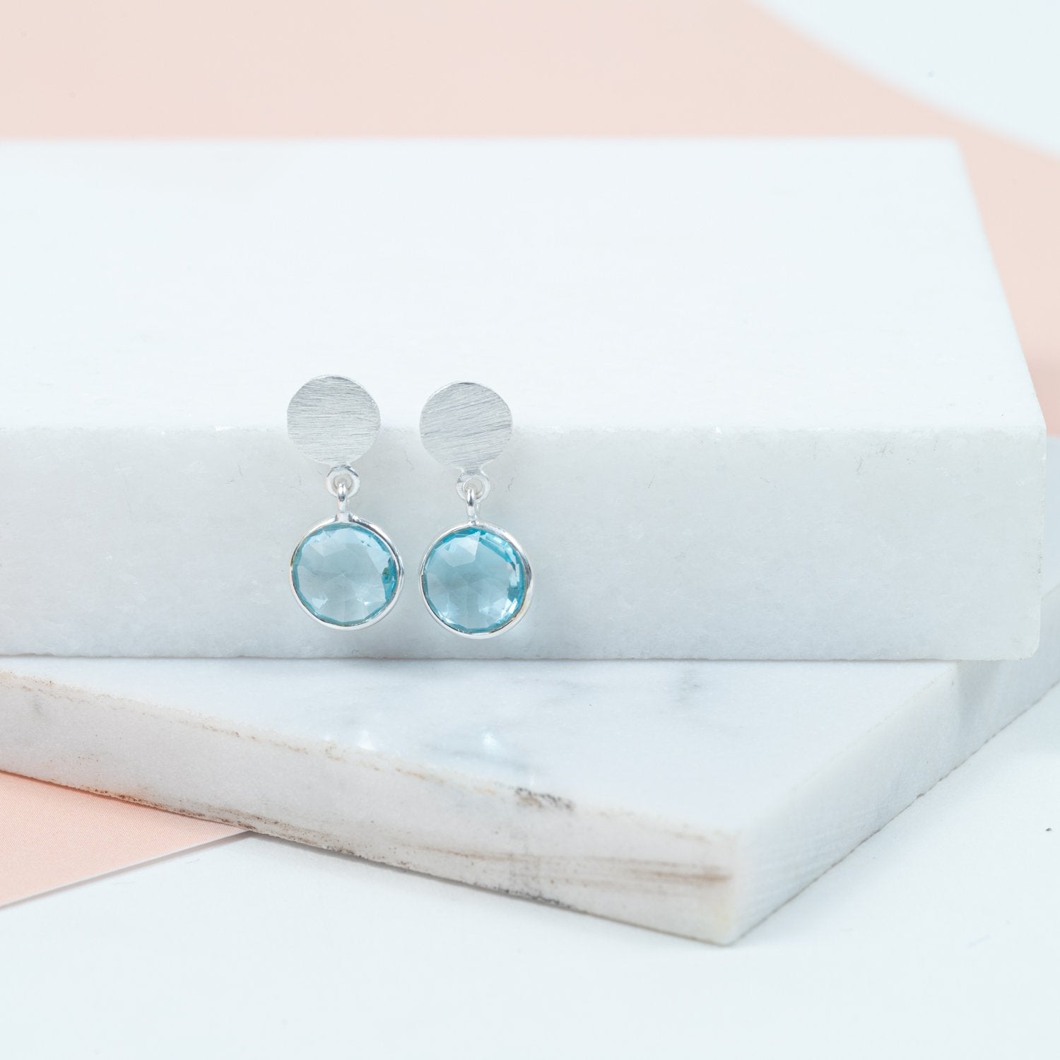 Salina Blue Topaz and Sterling Silver Disc Earrings