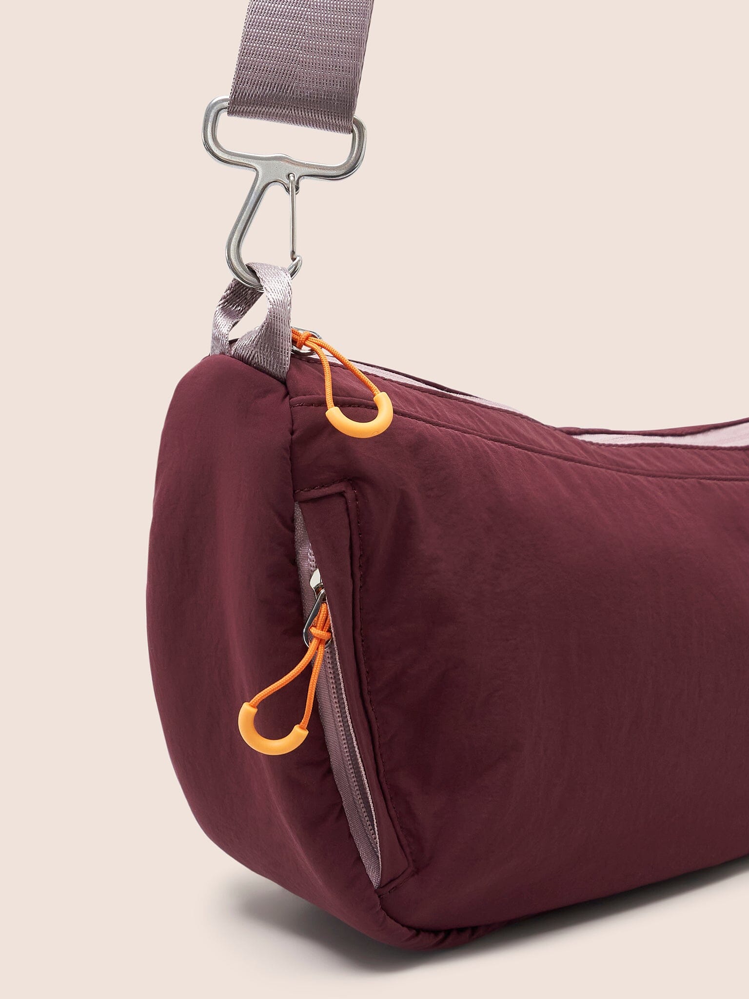 Ecuador Recycled Nylon Sling Bag in Burgundy
