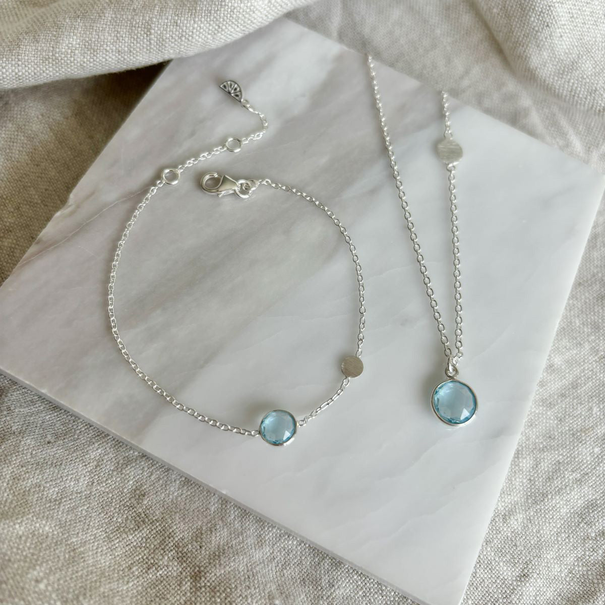 Salina Blue Topaz and Sterling Silver Disc Necklace